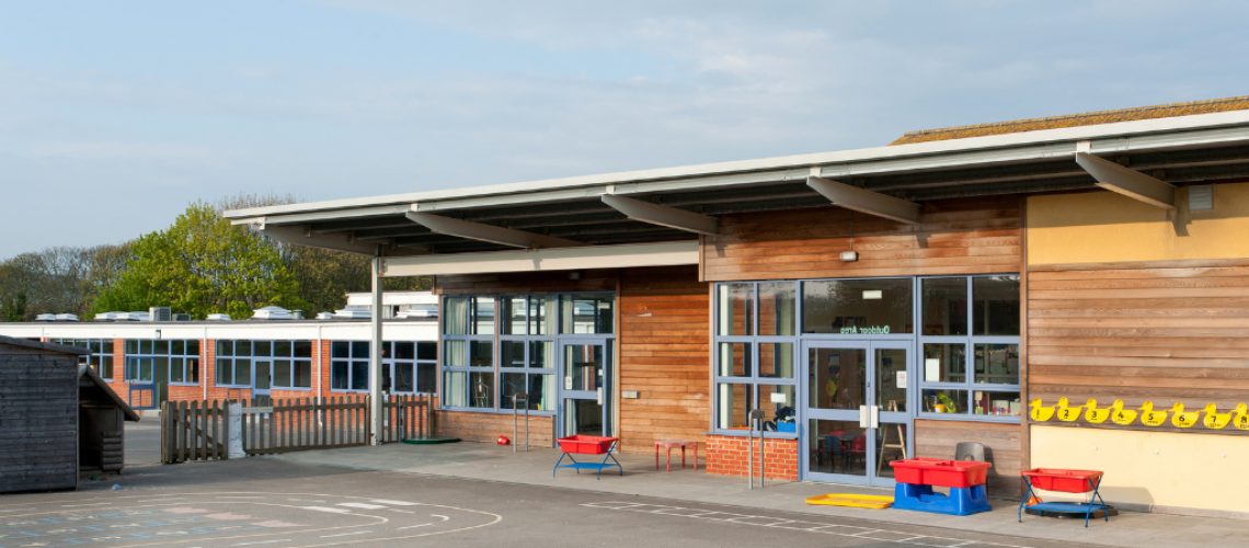 View of school classroom and playground to accompany fire protection for schools and nurseries blog and Fire Safety and Security Summer Holiday Updates for Schools